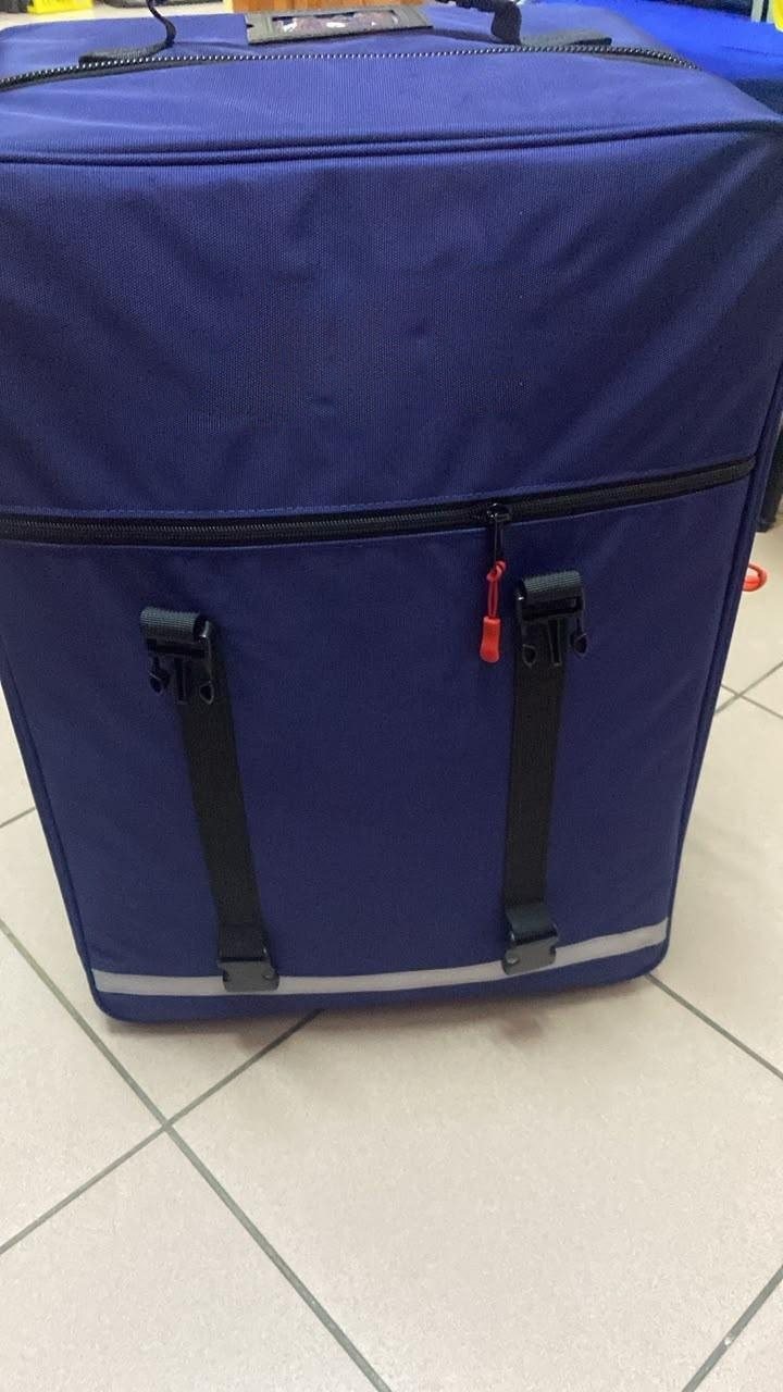 A navy pitchside emergency bag, packed and closed